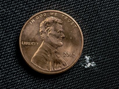 2 mg of Fentanyl next to penny.