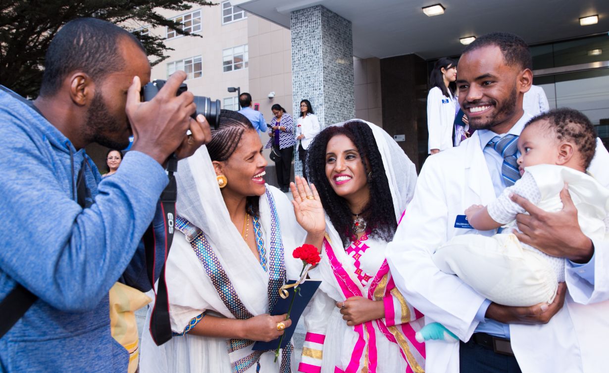 student with family members