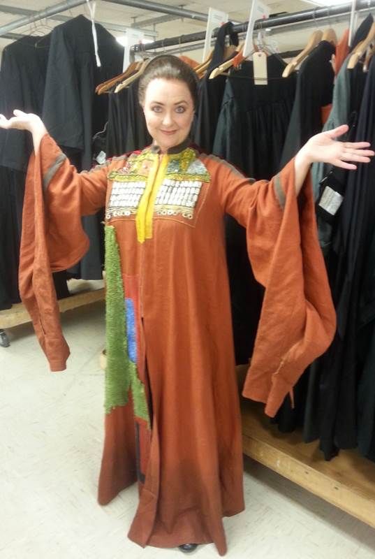 Peterson wearing an ornamental gown costume