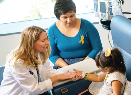 Janel Boyle and young cancer patient