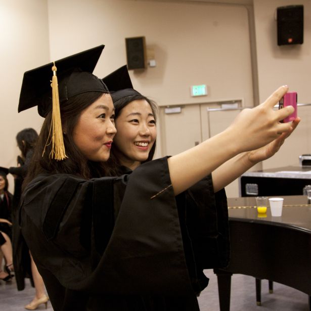 graduates take selfie