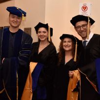 graduates wearing regalia.