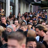 crowd of people on sidewalk
