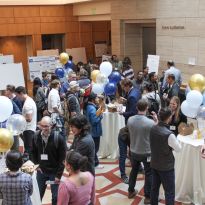 people mingling and networking is a building's foyer