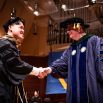 Graduating PharmD Immanuel Tjahjadi and UCSF Chancellor Hawgood
