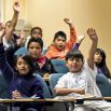 kids raising hands
