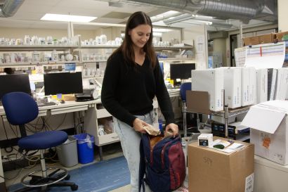 Parizher packs a backpack with buprenorphine for patients with opioid use disorder.