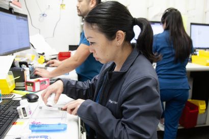 Nicole Ng, PharmD, counts pills at UCSF Health Parnassus Pharmacy