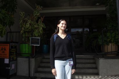 Parizher stands in front of SFDPH building