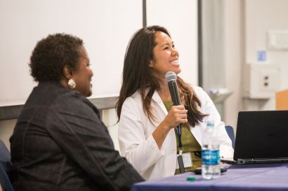 Patient and Cocohoba holding a microphone