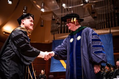 Graduating PharmD Immanuel Tjahjadi and UCSF Chancellor Hawgood