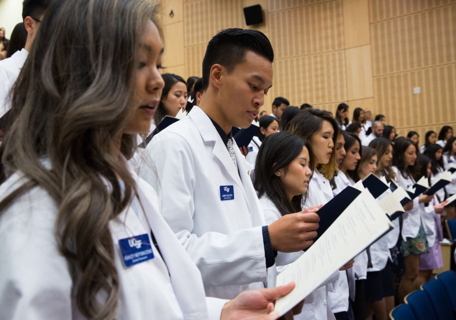 students in white coats