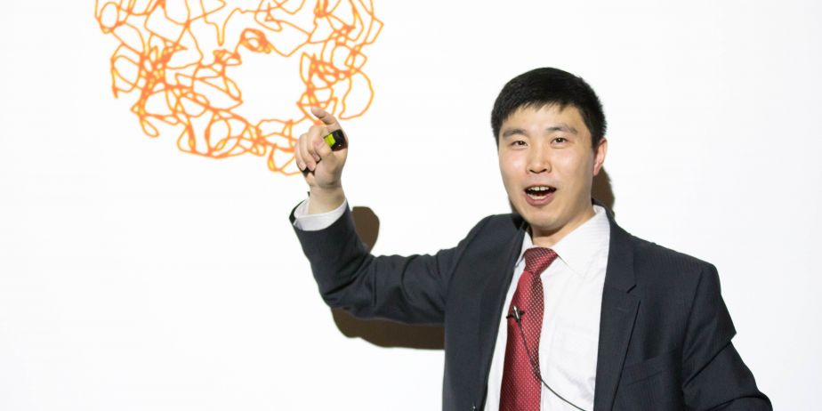 Huang with diagram of cell's genome