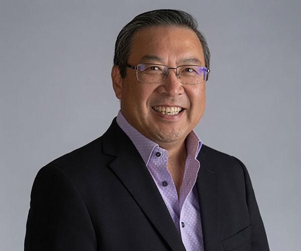 headshot of Brian Komoto