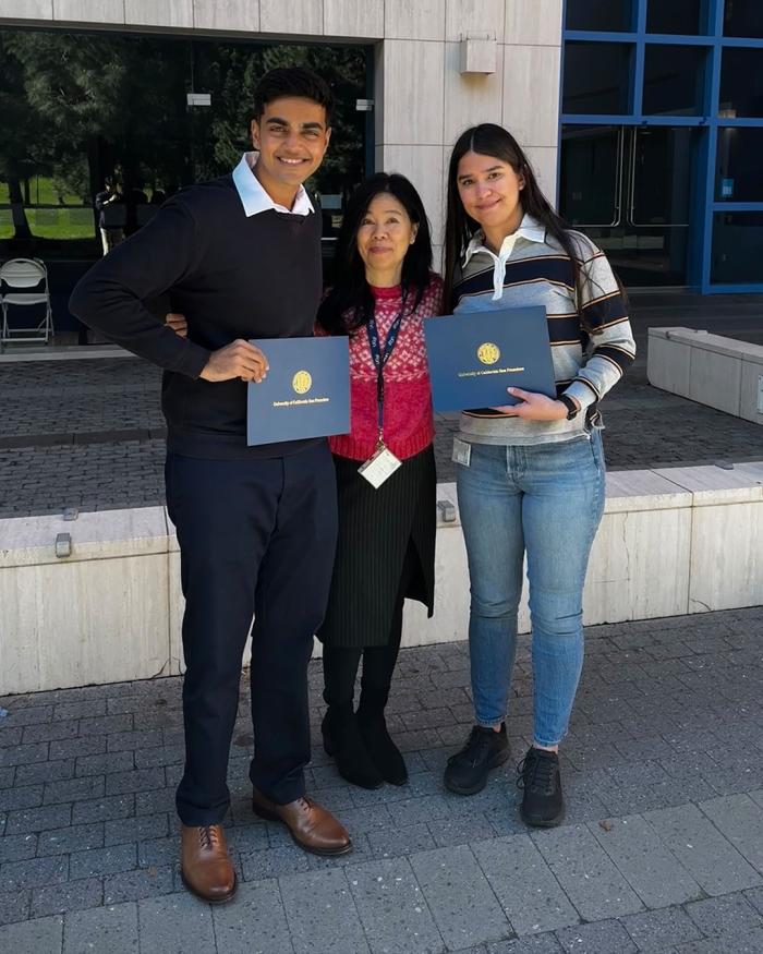Ravishankar Yadav and Tara Pande winning Hackathon 2026 with Joanna Chun center