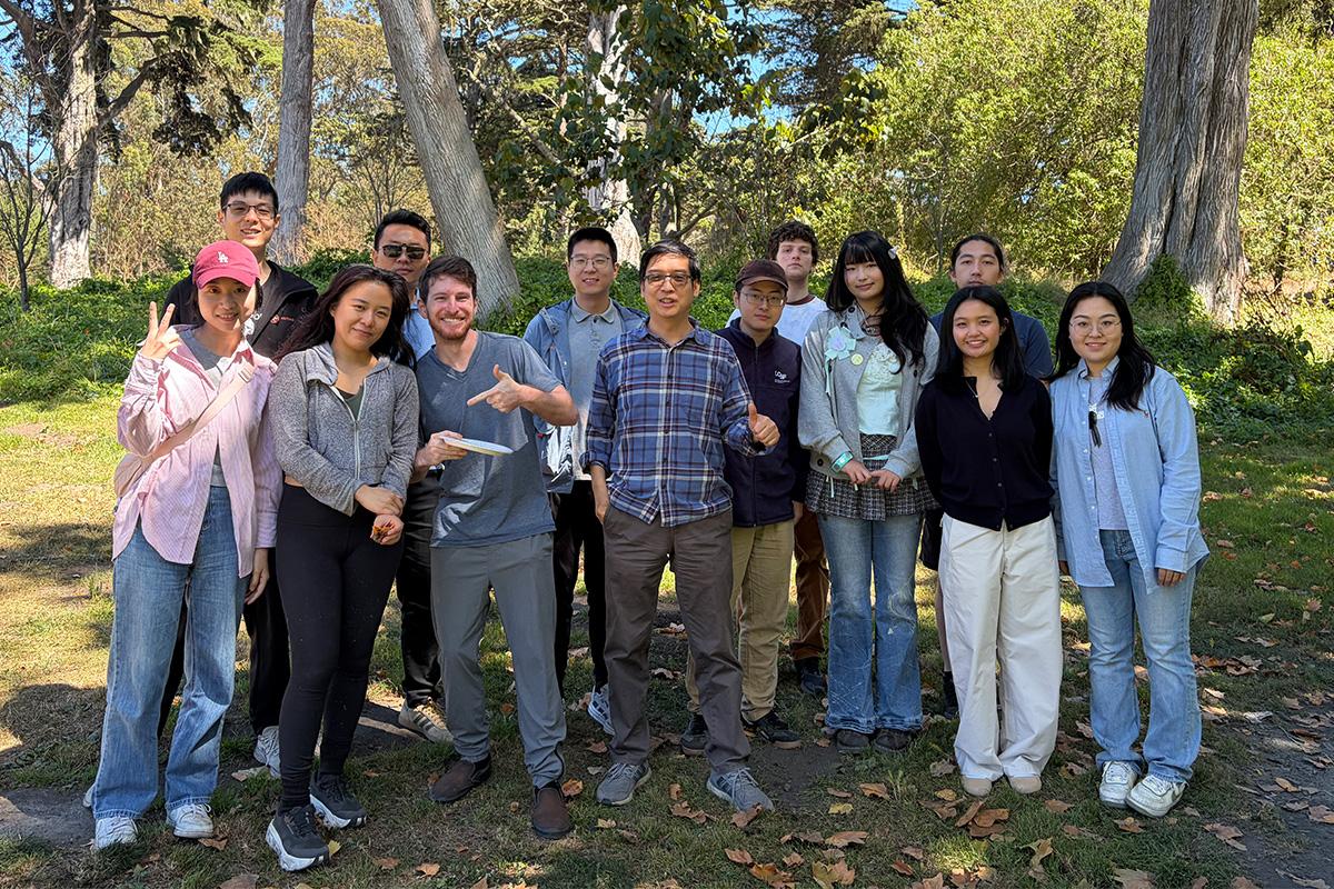 Liang Zhao lab members in tree-filled park